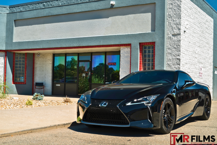 Ceramic window tint on a dark gray Lexus, providing enhanced heat rejection and privacy.